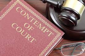 Respondent Disputes Contempt Charges